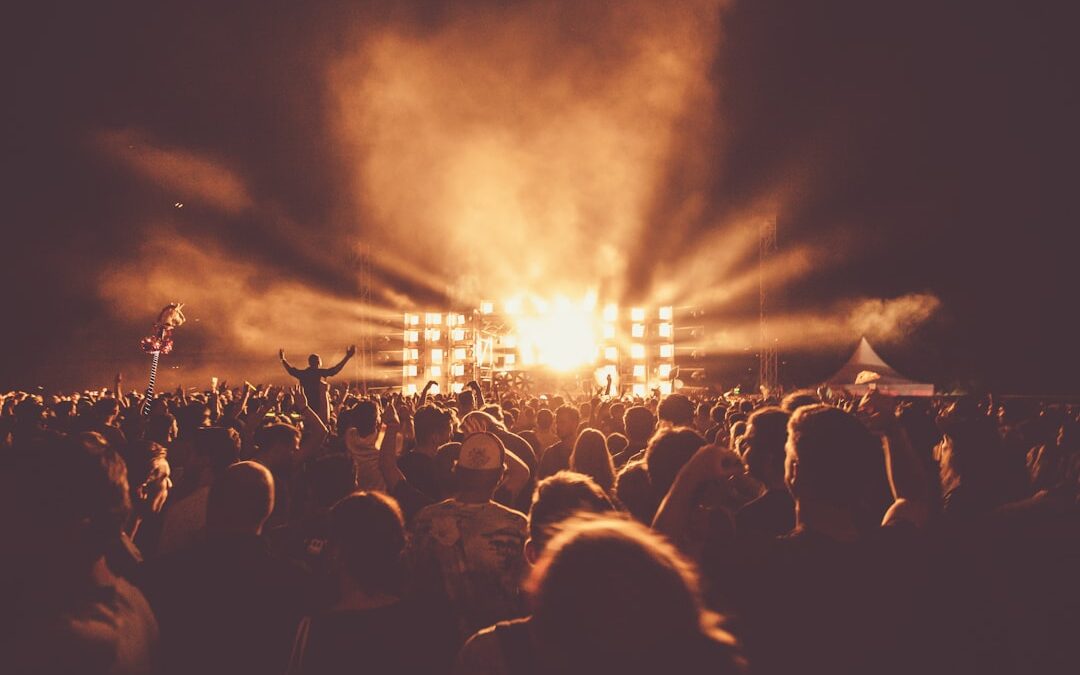 During a show of Melt Festival when Nina Kraviz was playing behind the decks. The crowd went wild during her set which was extremely good. I was dancing with my camera in my hand while taking shots. The smoke and light hit the people just right and I quickly climbed on the shoulders of a friend to take this shot.