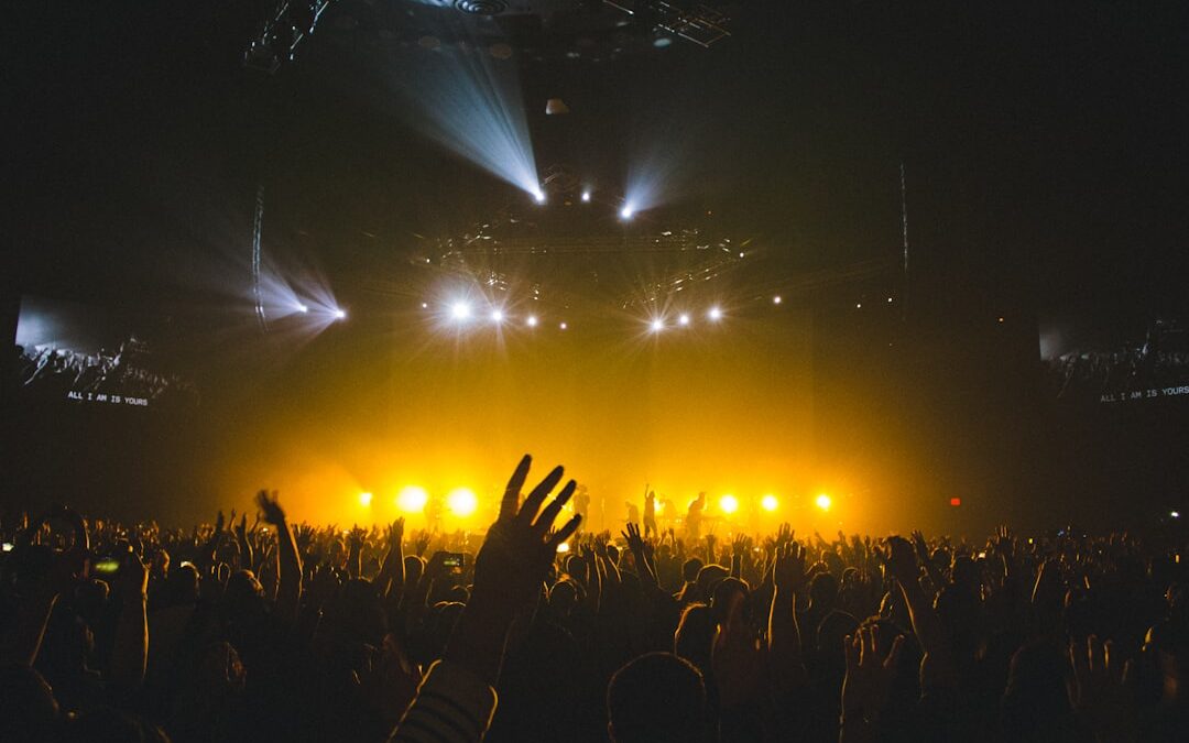 Band members in yellow lights
